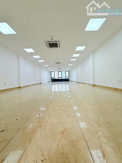 TOÀ VP MẶT PHỐ TRẤN VỸ LÔ GÓC - 8 TẦNG NỔI - MỘT HẦM XÂY MỚI