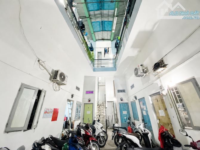 Nhà trọ 4 tầng, Lý Phục Man - 137m2, Ngang 10m (nở hậu), dòng tiền 40tr/tháng. Chỉ 11 tỷ
