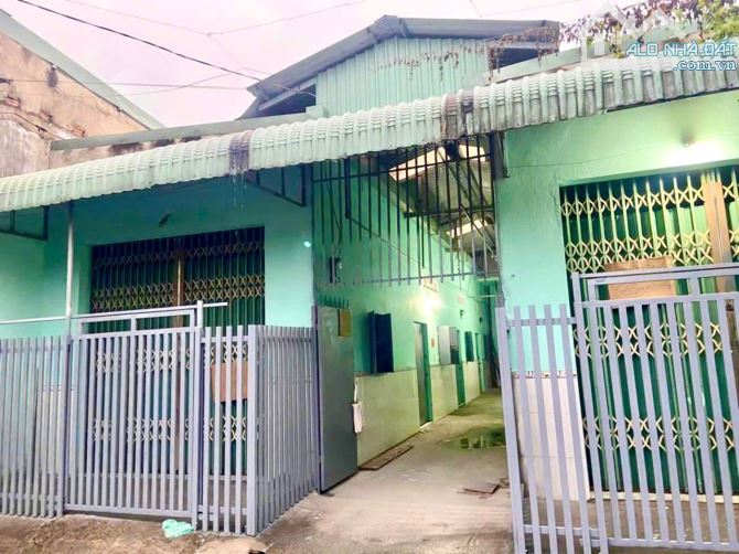 Bán Nhà Trọ 187m2(10x18,6m), có 8 phòng, HXH 1 sẹc gần Trường Lục Quân 2, P.Tam Phước, ĐN
