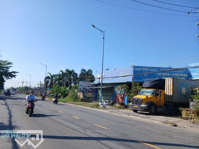 Bán 1669m2 Đất + Nhà Kho 3 Mặt Tiền Đường Phạm Hùng, Có 800m2 Đất SKC,Phường Trung An,