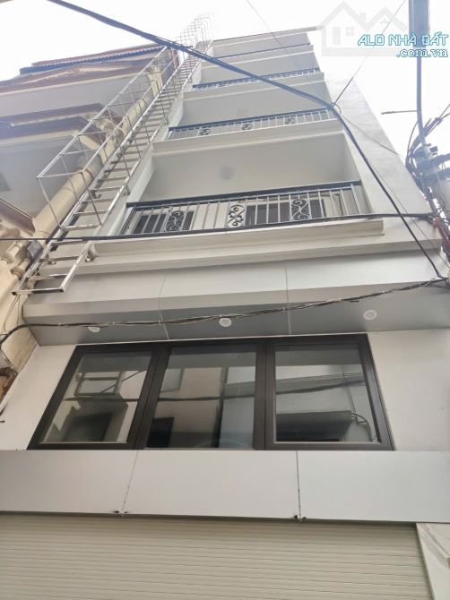 Hiếm 7 tầng thang máy Văn Phòng CTY kdoanh Phố Vọng oto vào nhà ngõ thông 85m2. Gấp 28 tỷ