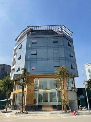 Cho thuê văn phòng: Cho thuê tòa nhà văn phòng 6 tầng + 1 bán hầm lô góc 3 mặt t