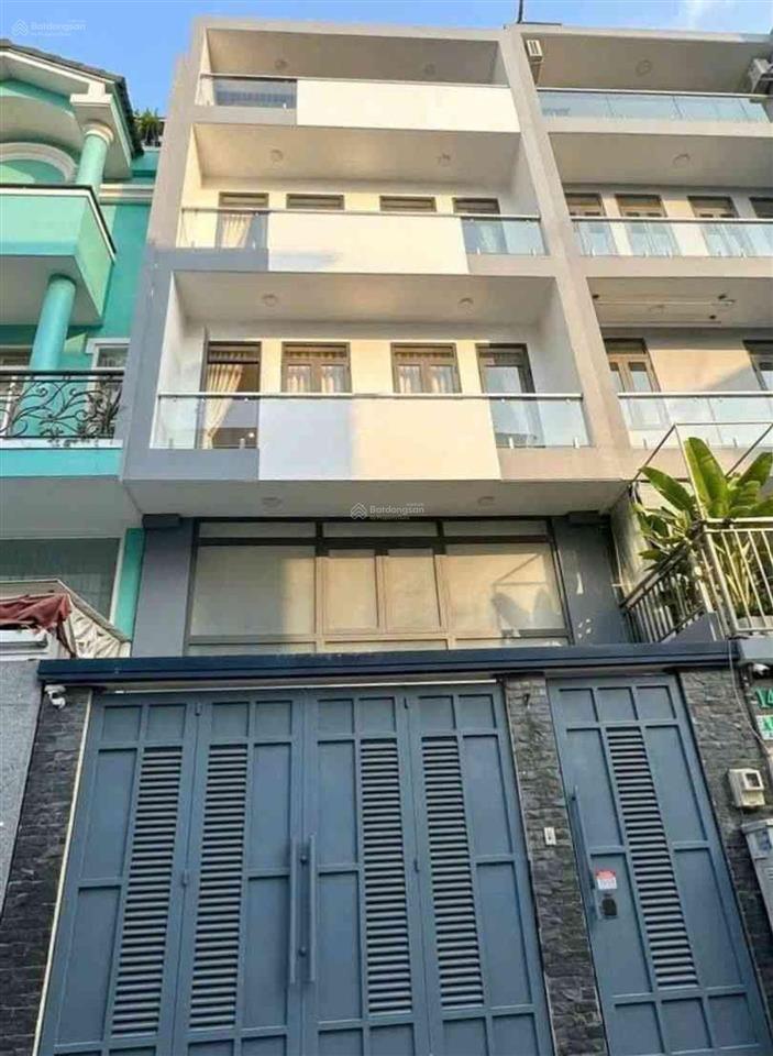 Nhà 4 tầng, hẻm xe hơi tránh nguyễn thái sơn, 5.7x10, kế bên đh văn lang